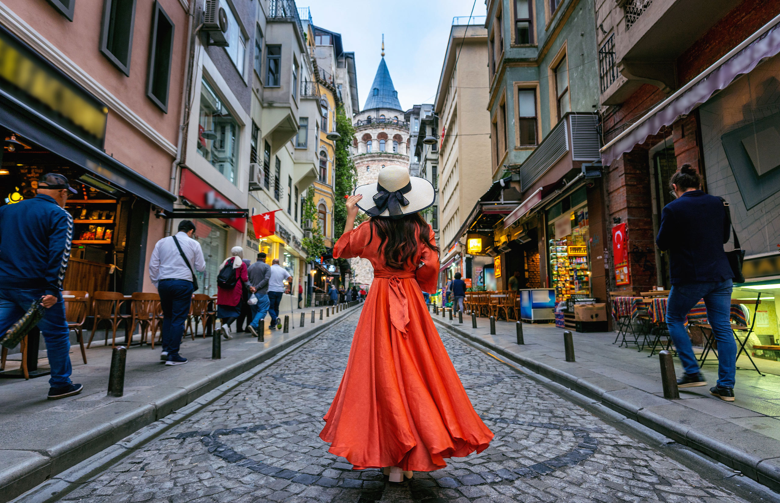 Woman standing at Galata tower in Istanbul, Turkey